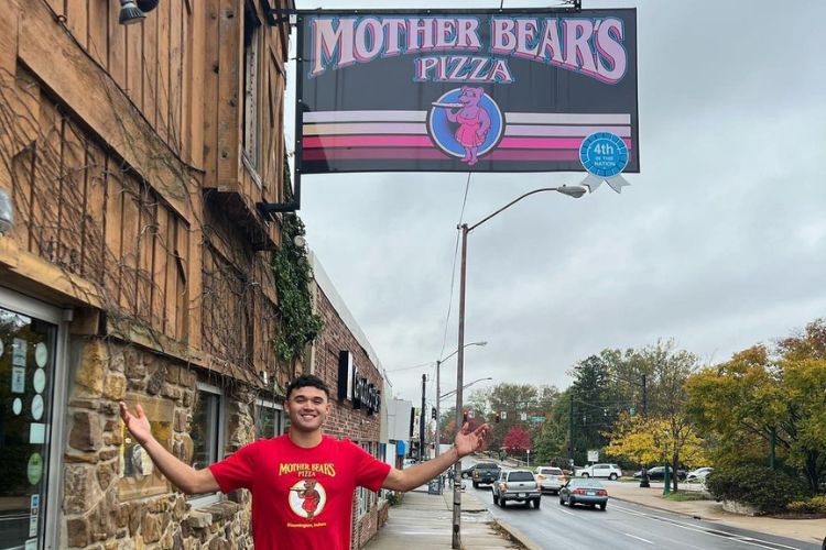 Anthony Pictured Outside Mother Bear's Pizza In 2023