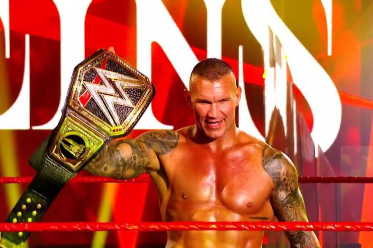 Randy Orton Poses With The WWE Belt 