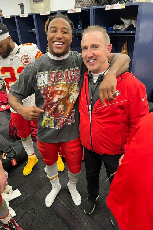 Steve Spagnuolo With Justin Reid Who Is Wearing "In Spags We Trust" T-shirt