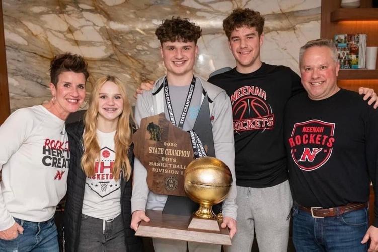 The Klesmit Family, Including Parents Rich And Kelly, And Siblings Rowan, Cal, And Max, With The WIAA State Championship Trophy