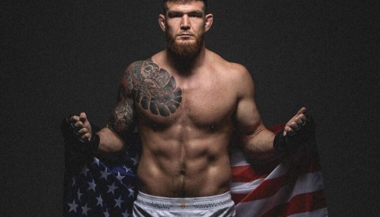 Johnny Eblen Pictured Carrying The American Flags For One Of His Promo
