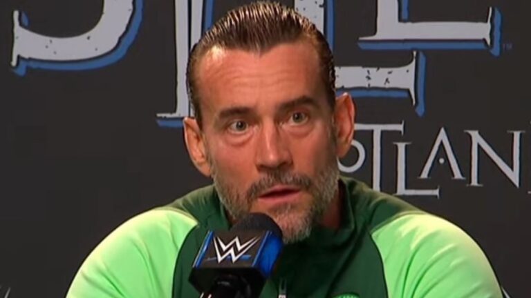 Cm Punk pictured while speaking on mic
