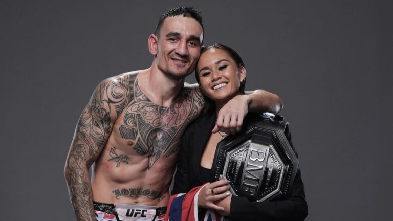 Max Holloway hugging his wife