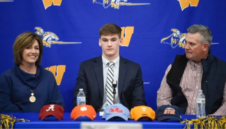 Ty Simpson with his parents, Jason and Julie Simpson