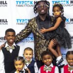 Tyreek Hill with his seven kids