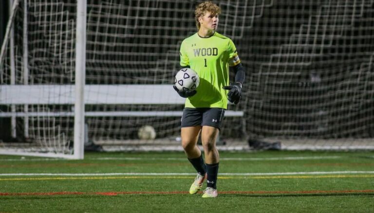 Julian Naumenko wearing his Archbishop Wood jersey