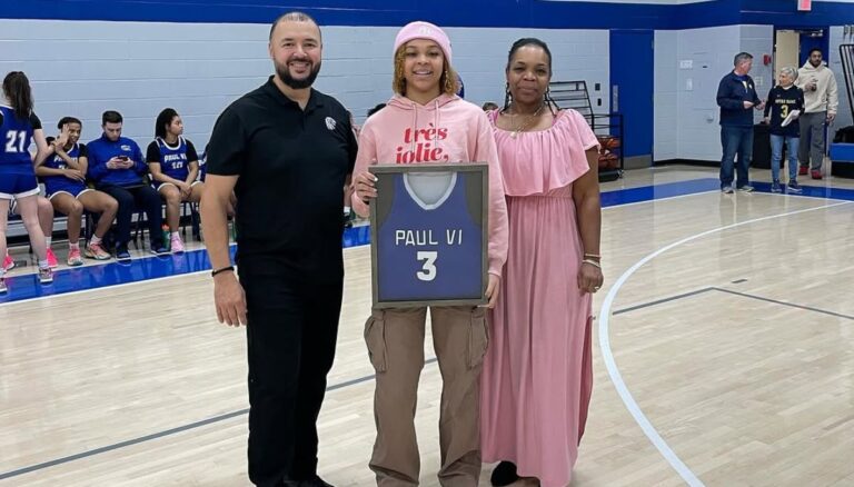 Notre Dame Point Guard Hannah Hidalgo With Her Parents Orlando And Tamara Hidalgo In 2023 At Her High School Paul VI Basketball Court As She Is Honored With Her Jersey