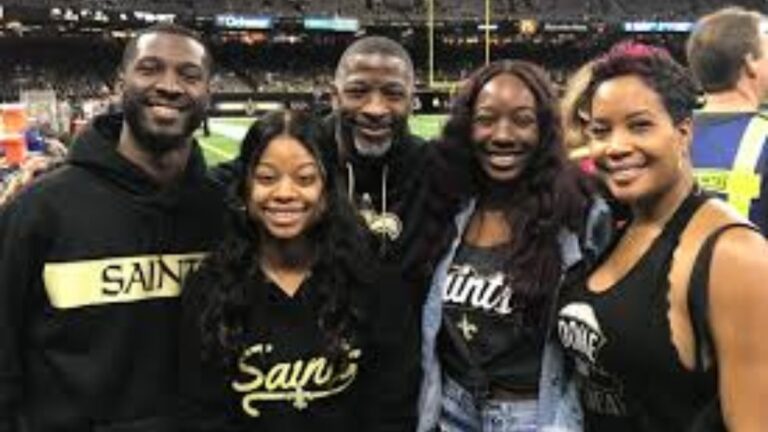 Aaron Glenn with his wife Devaney and three children