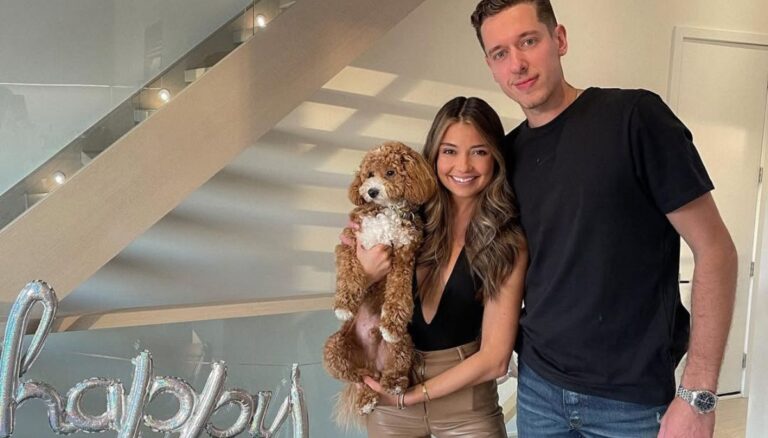 NHL Goalie Jordan Binnington Pictured With His Wife Cristine Prosperi In 2021 With Their Fury Friend