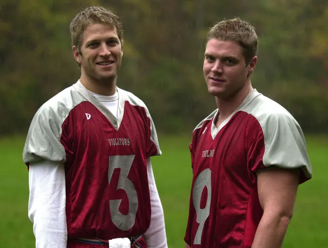 Chris and Rob Violante during halftime of a Yorktown Flag Football game on Oct. 19, 2003.