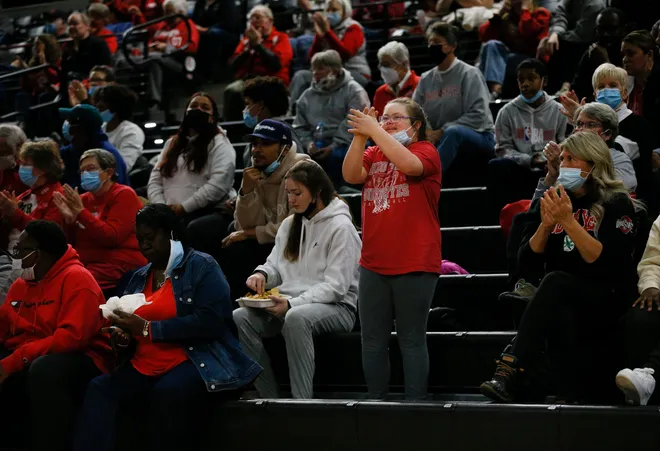 Emmy cheering for her sister Jacy during a game in 2021.