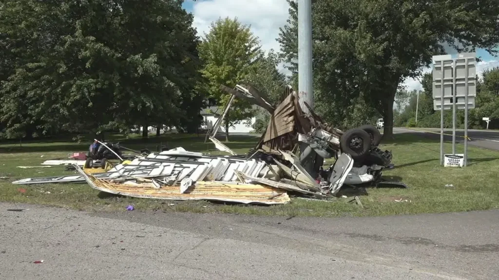 A damaged truck lies at a deadly crash site in Canandaigua on August 27, 2025.