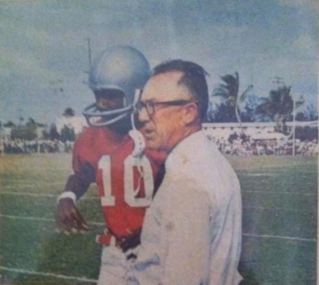 Coral Gables High School quarterback Craig Curry with head coach Nick Kotys in 1967