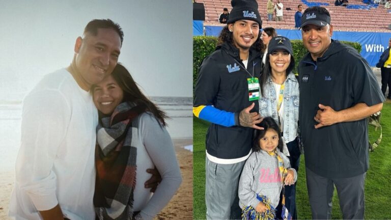 Ikaika Malloe taking a picture his with wife Tara, and kids.