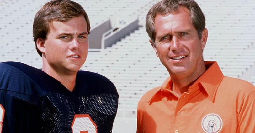 Coach Mike White with his son