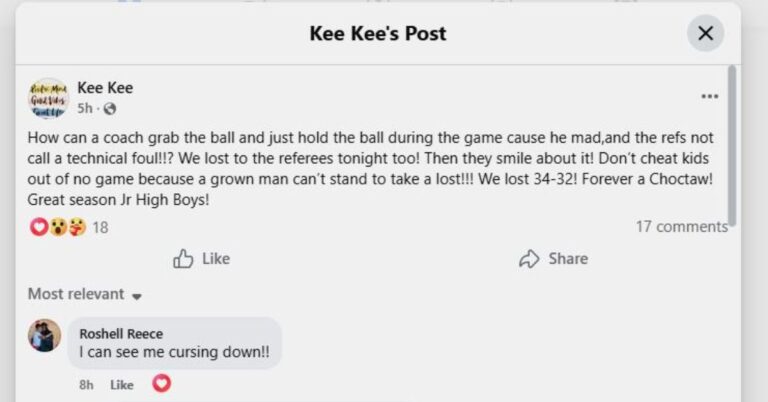 Coach Holds Ball in Frustration