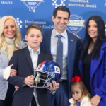 Joe Schoen with his wife and children