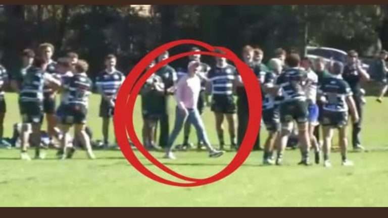 mum storms rugby field