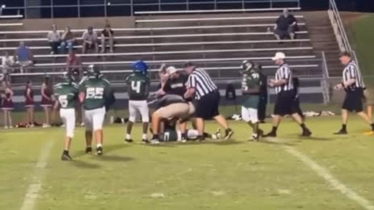 Teen charged after tackling middle school football player
