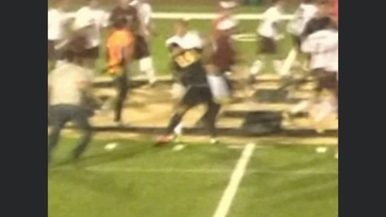teen tackles middle school football player